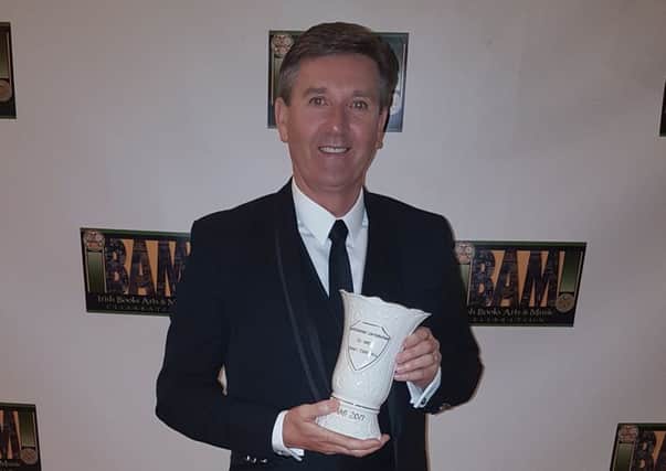 Daniel O'Donnell pictured in Chicago with his award.